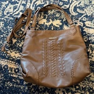 Large taupe bag with peach colored inner lining. Extra strap included.